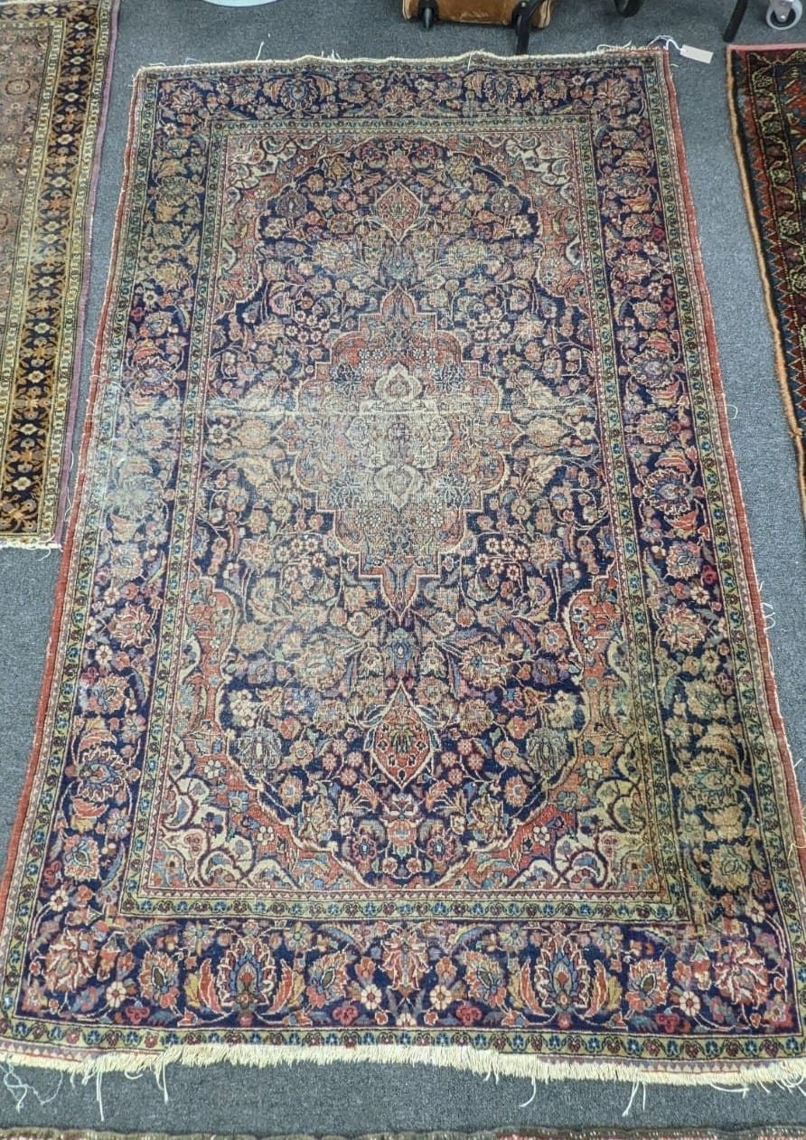 A Kashan rug and a Turkish rug, larger 194 x 123cm